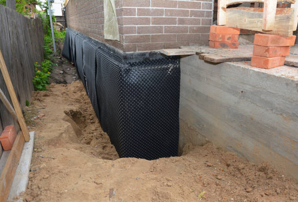 SJ Waterproofing Pros technician performing targeted Waterproofing assessment in Bryn Mawr, PA